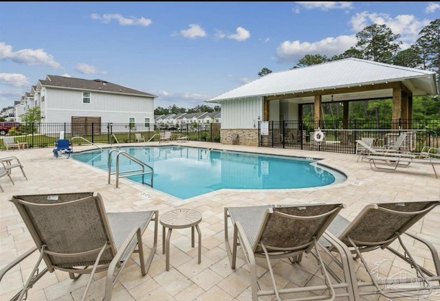 9668 Nature Creek Blvd, Pensacola, FL 32526 - community pool with a patio