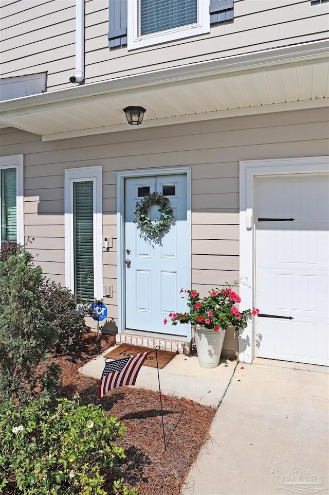 9668 Nature Creek Blvd, Pensacola, FL 32526 - property entrance with a garage