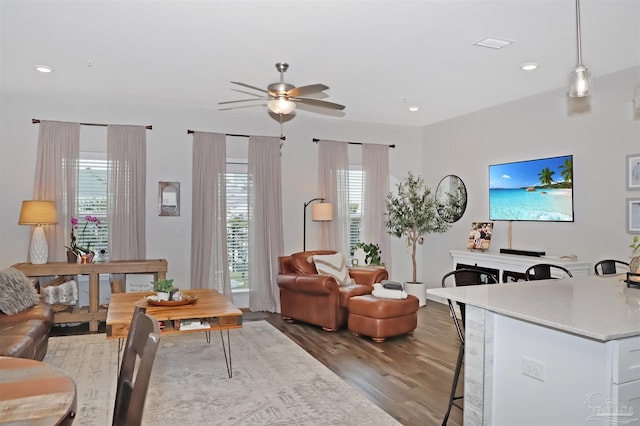 9668 Nature Creek Blvd, Pensacola, FL 32526 - living room with wood finished floors, a ceiling fan, plenty of natural light, and recessed lighting