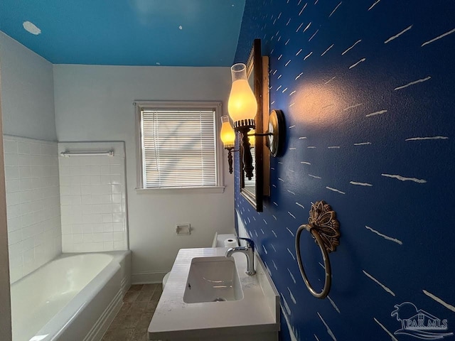 bathroom featuring sink and shower / bathing tub combination