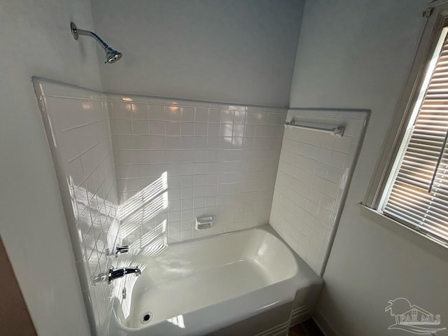 bathroom with shower / tub combination