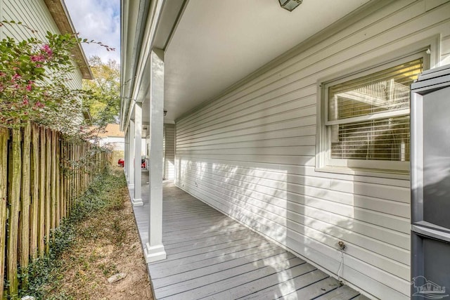 view of property exterior with fence