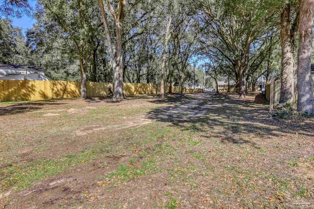 view of yard featuring fence