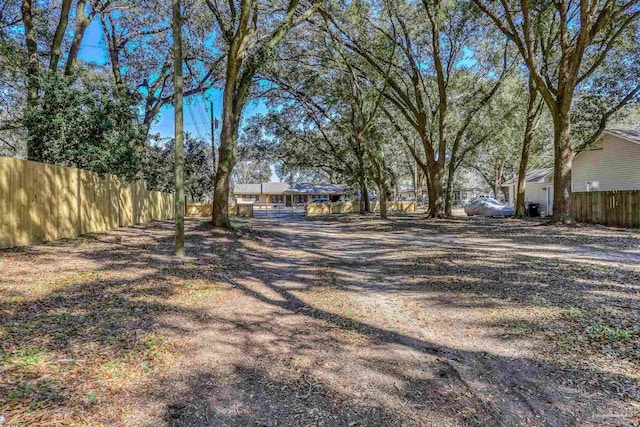 view of yard with fence