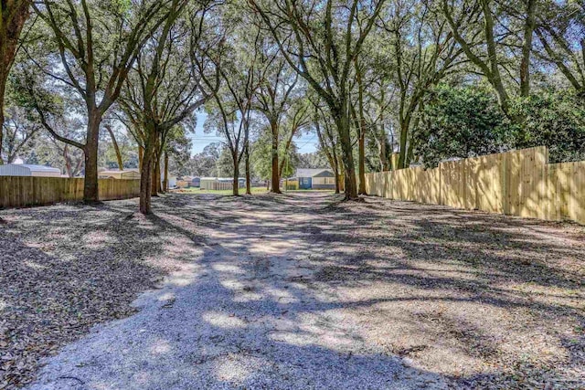 view of yard with fence