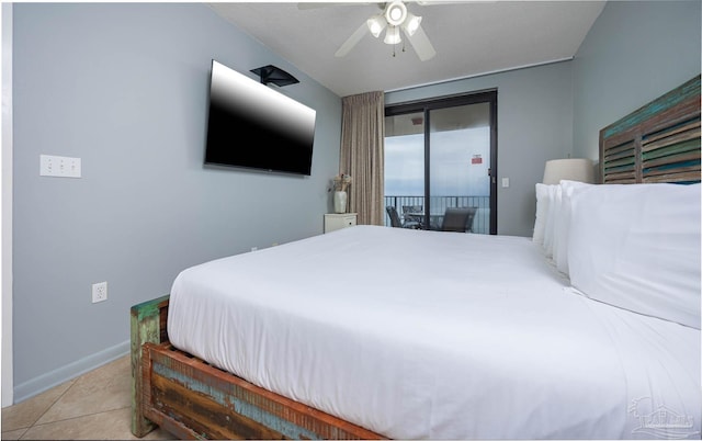 bedroom featuring access to exterior, tile patterned floors, baseboards, and a ceiling fan