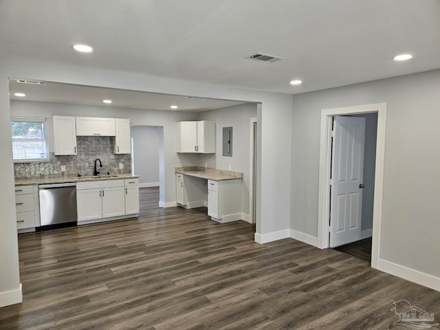 kitchen featuring white cabinets, sink, stainless steel dishwasher, decorative backsplash, and dark hardwood / wood-style floors