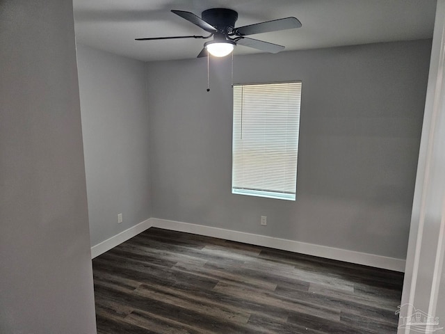 spare room with wood-type flooring, a wealth of natural light, and ceiling fan