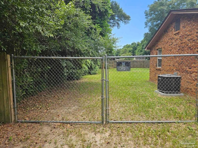 view of yard featuring central AC unit