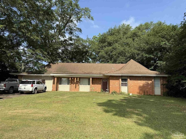 5325 Bob Sikes Blvd, Jay, FL 32565 - ranch-style home with a front yard and brick siding
