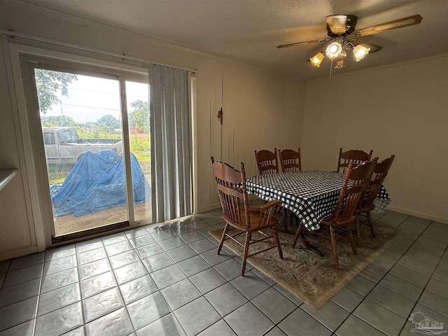 5325 Bob Sikes Blvd, Jay, FL 32565 - dining room with crown molding, light tile patterned flooring, and a ceiling fan