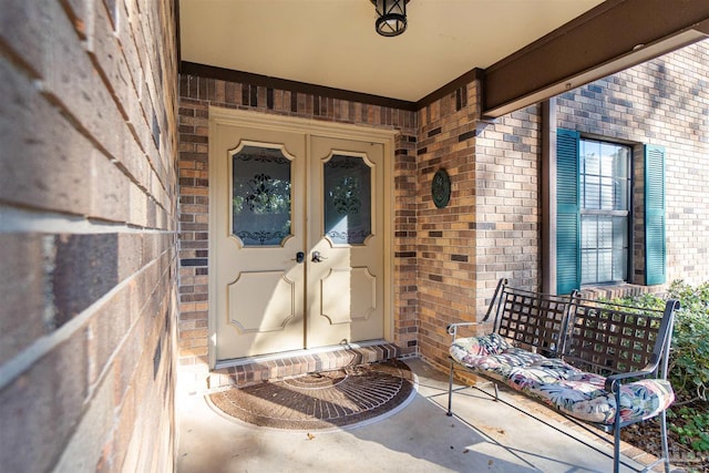 property entrance featuring french doors