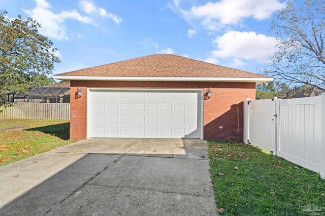 garage with a yard