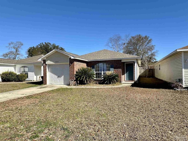 ranch-style home featuring a garage, brick siding, concrete driveway, and a front yard