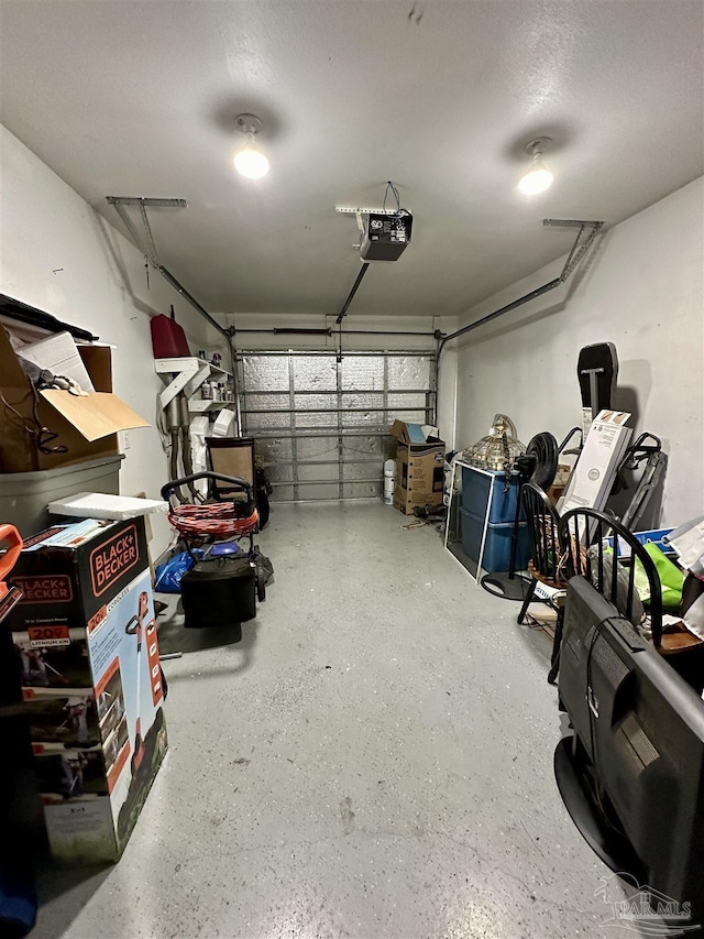 garage featuring a garage door opener