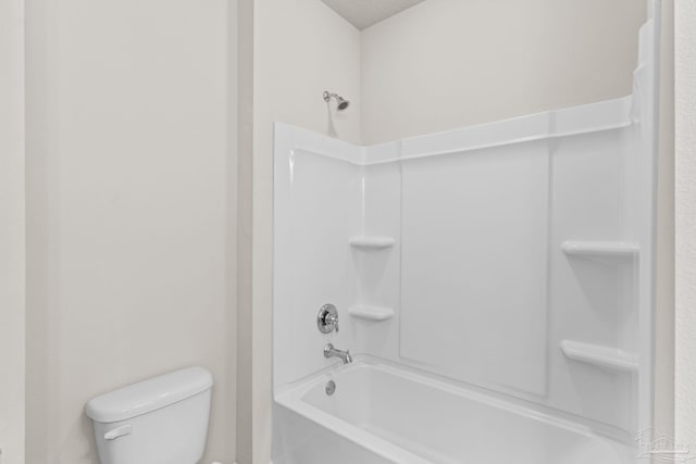 bathroom with toilet and shower / tub combination