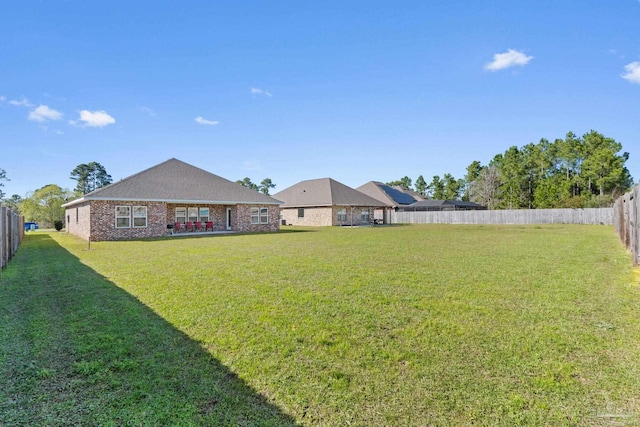 view of yard featuring a fenced backyard