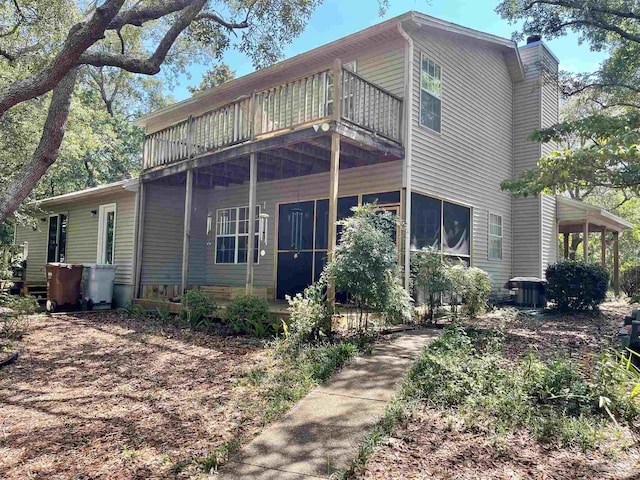 view of front of property with a balcony