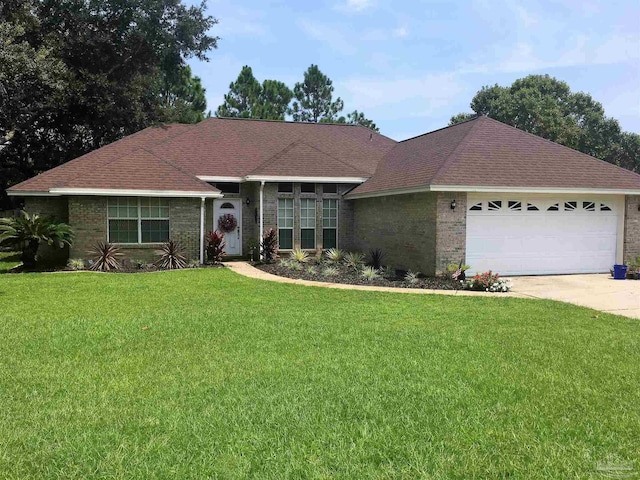 ranch-style home with brick siding, a front lawn, concrete driveway, roof with shingles, and a garage