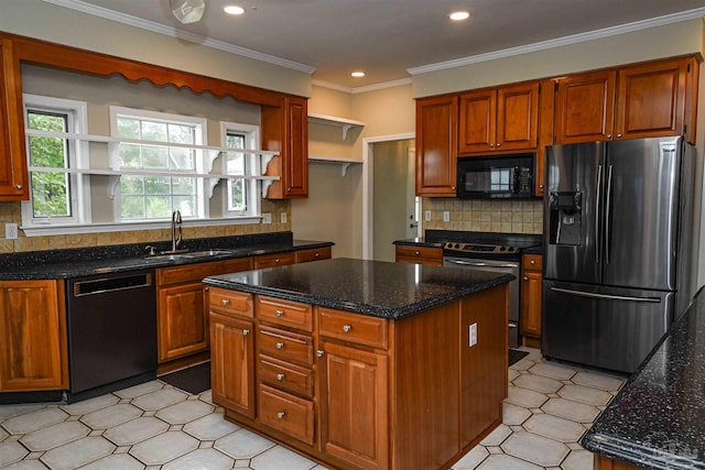 kitchen featuring sink, a kitchen island, black appliances, dark stone counters, and crown molding