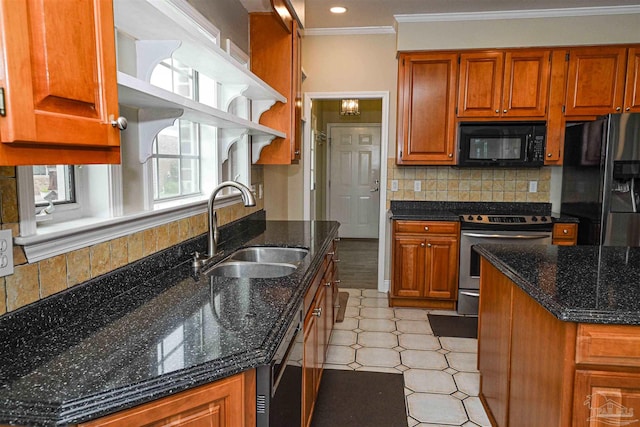 kitchen with tasteful backsplash, black appliances, dark stone counters, ornamental molding, and sink