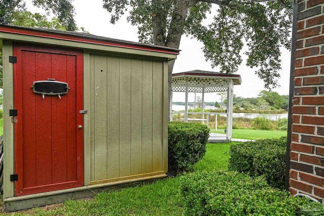 view of outbuilding featuring a water view