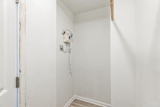 detailed view of wood finished floors and baseboards