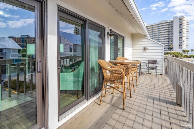 balcony featuring a sunroom