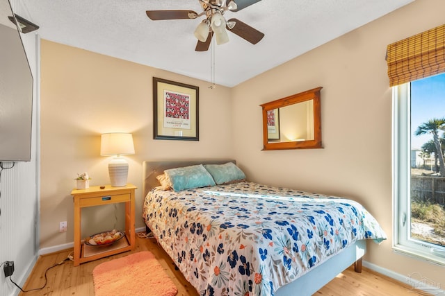 1112 Maldonado Dr, Pensacola Beach, FL 32561 - bedroom featuring ceiling fan and light wood-type flooring