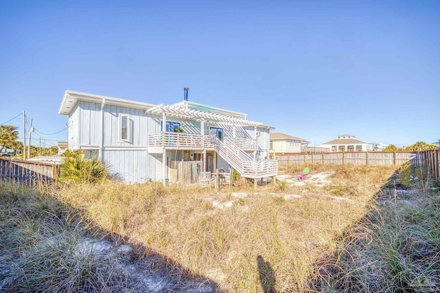 1112 Maldonado Dr, Pensacola Beach, FL 32561 - back of house with a pergola