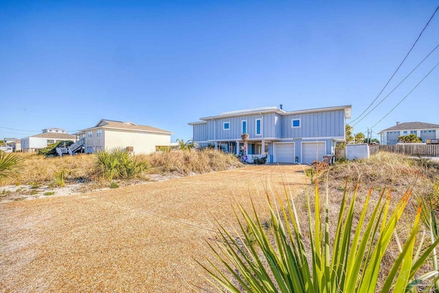 1112 Maldonado Dr, Pensacola Beach, FL 32561 - exterior space with a garage