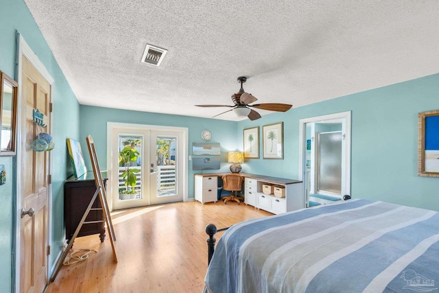 1112 Maldonado Dr, Pensacola Beach, FL 32561 - bedroom with french doors, ceiling fan, access to exterior, light wood-type flooring, and a textured ceiling