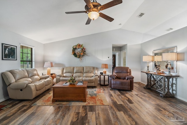 living room with visible vents, baseboards, wood finished floors, a ceiling fan, and lofted ceiling