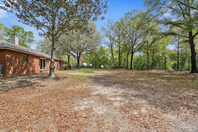 view of yard featuring fence