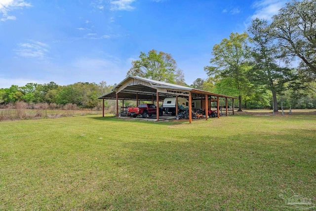 view of yard featuring a detached carport