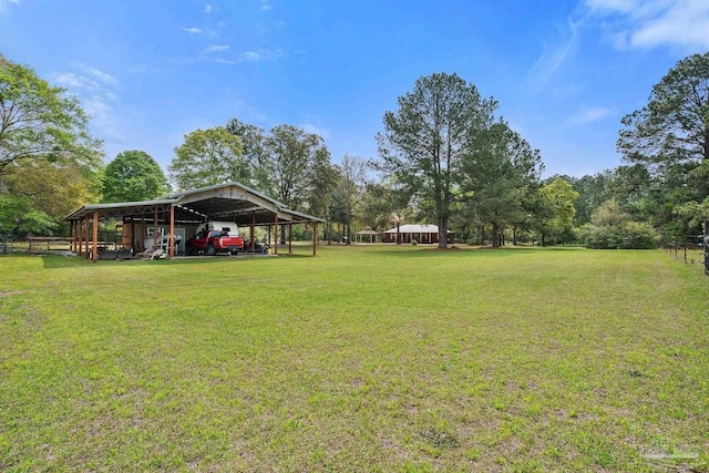 view of yard with a carport