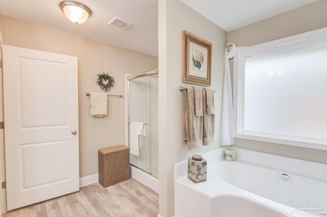 carpeted bedroom featuring ceiling fan, ornamental molding, and a raised ceiling