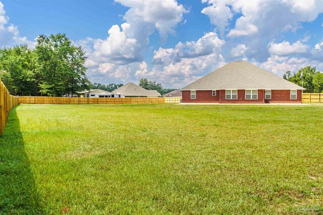 view of front facade with a garage and a front lawn