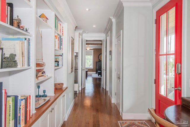 hall with crown molding and dark hardwood / wood-style floors