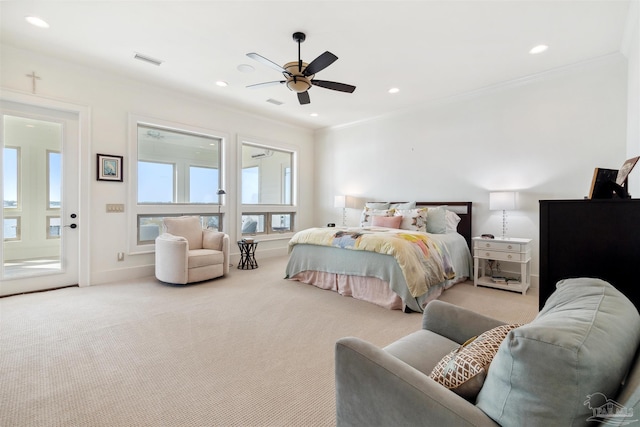 bedroom featuring crown molding, ceiling fan, and light colored carpet