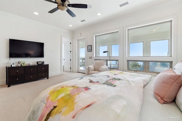 bedroom with multiple windows, ornamental molding, light carpet, and ceiling fan