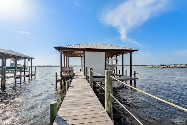 view of dock with a water view