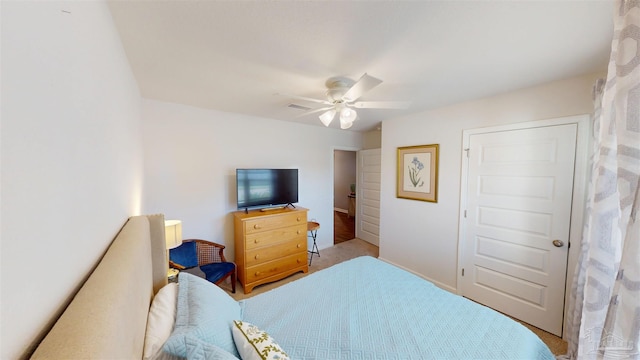 bedroom featuring visible vents and ceiling fan