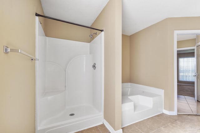 bathroom featuring tile patterned floors and a shower