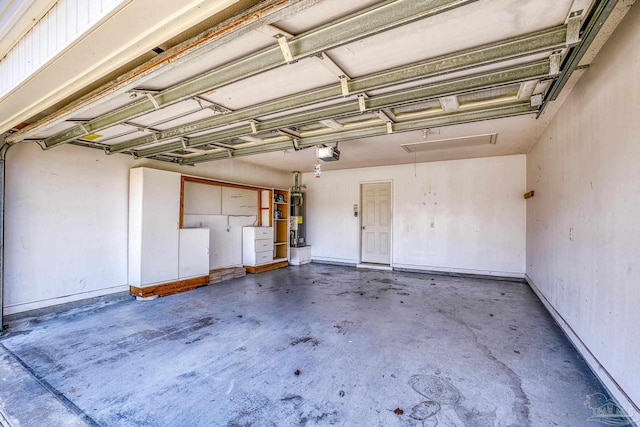 garage with a garage door opener and gas water heater