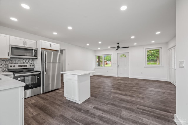 4732 Pine Ln, Pace, FL 32571 - kitchen with appliances with stainless steel finishes, healthy amount of natural light, recessed lighting, ceiling fan, and white cabinetry