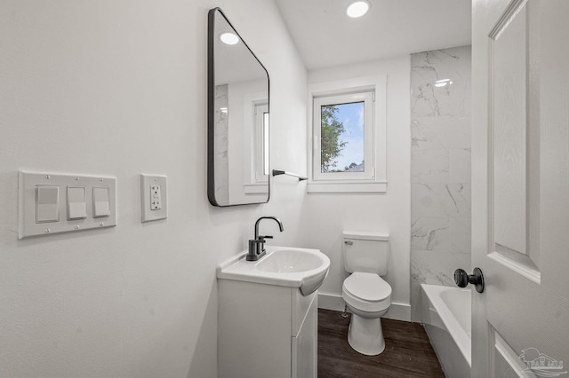 4732 Pine Ln, Pace, FL 32571 - bathroom with vanity, wood finished floors, recessed lighting, and bathtub / shower combination
