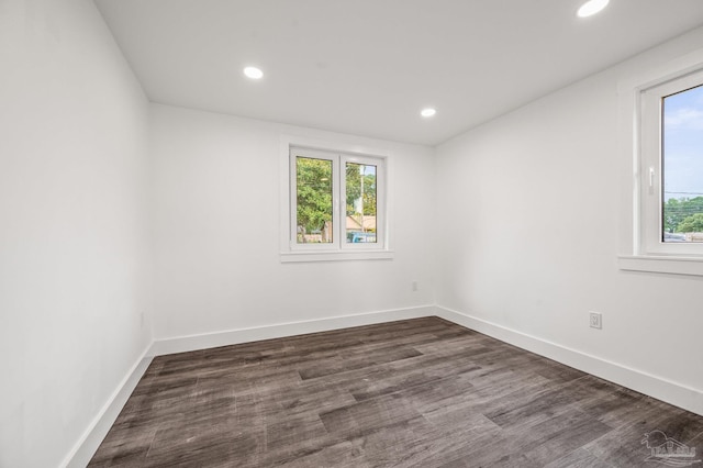 4732 Pine Ln, Pace, FL 32571 - unfurnished room featuring healthy amount of natural light, recessed lighting, and dark wood-style flooring