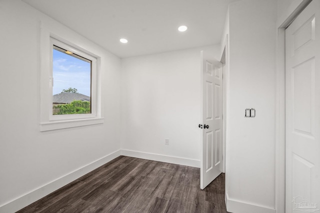 4732 Pine Ln, Pace, FL 32571 - spare room featuring dark wood-style floors and recessed lighting