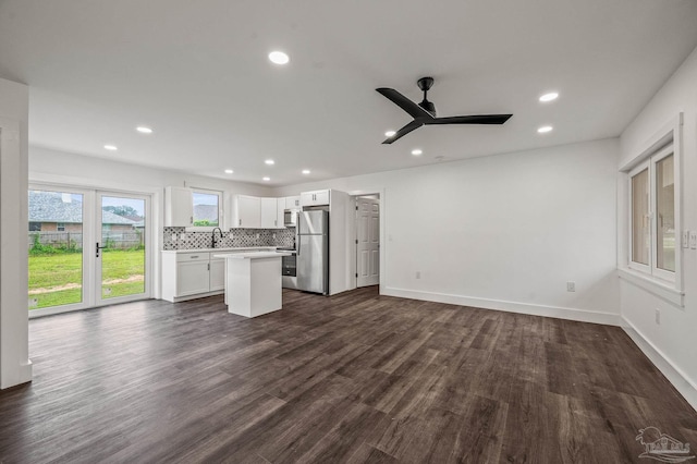 4732 Pine Ln, Pace, FL 32571 - kitchen with appliances with stainless steel finishes, a center island, recessed lighting, open floor plan, and light countertops